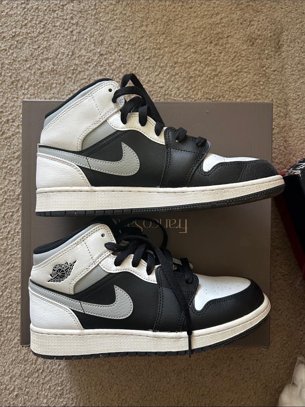Nike Black and White Mid-Top Sneakers